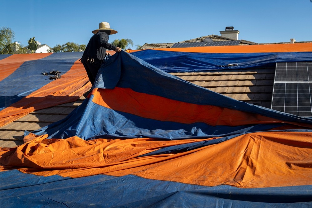 Storm Damage Restoration With Emergency Roof Tarping and Water Mitigation