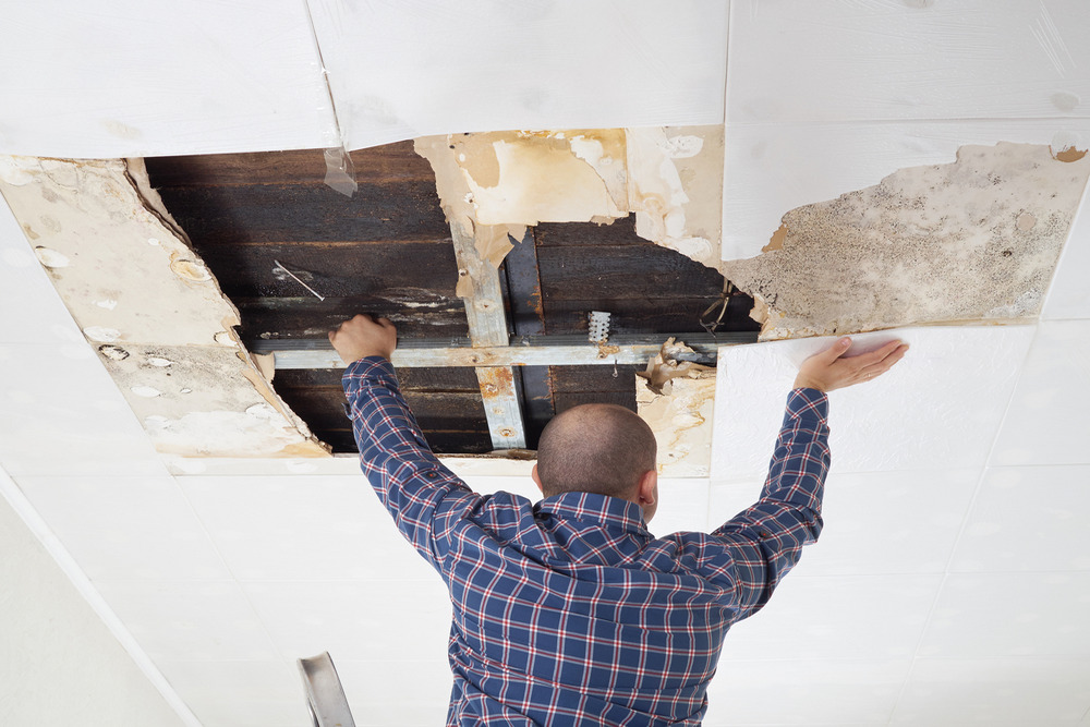 The Warning Signs of Hidden Ceiling Water Damage After Roof Leaks